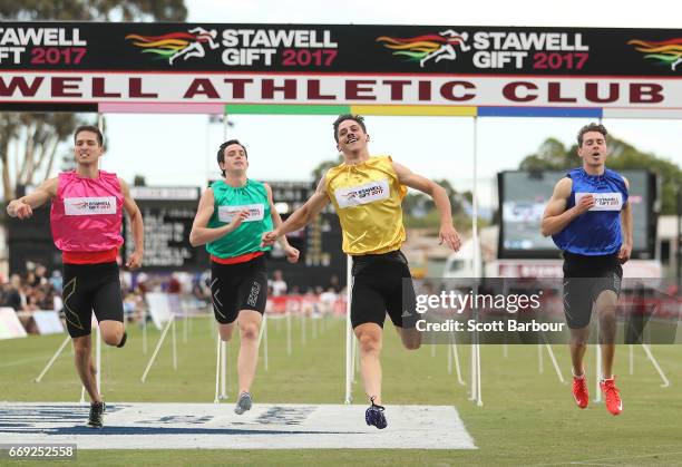 Matthew Rizzo celebrates as he crosses the finish line to win the 2017 Stawell Athletic Club Stawell Gift - 120m Final race during the 2017 Stawell...