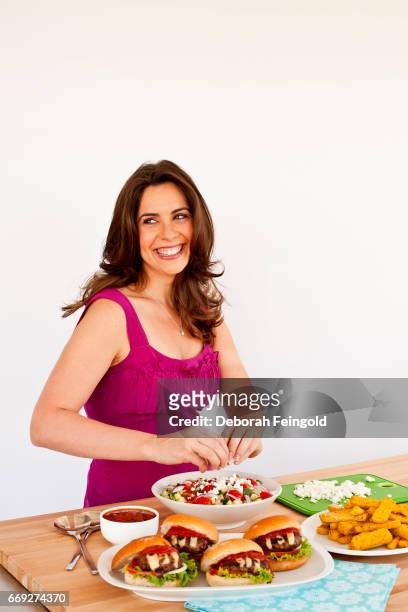 Deborah Feingold/Corbis via Getty Images) NEW YORK Cookbook author and media personality Devin Alexander poses for a portrait in 2010 in New York...