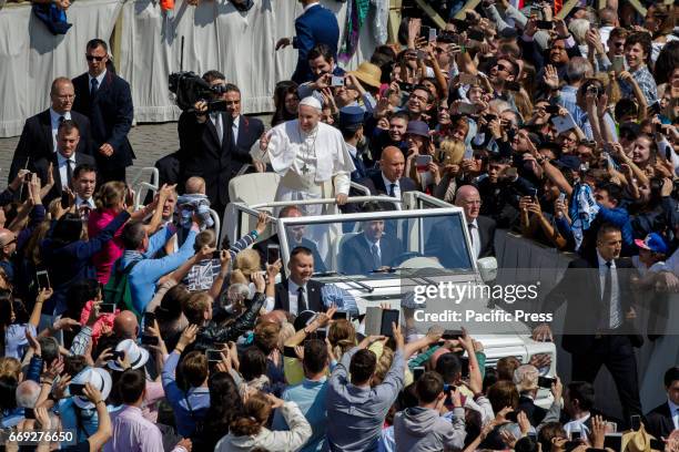 Pope Francis leads the Easter Sunday Mass in St. Peter's Square in Vatican City, Vatican on April 16, 2017.