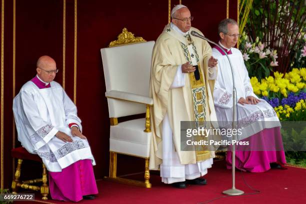 Pope Francis leads the Easter Sunday Mass in St. Peter's Square in Vatican City, Vatican on April 16, 2017.