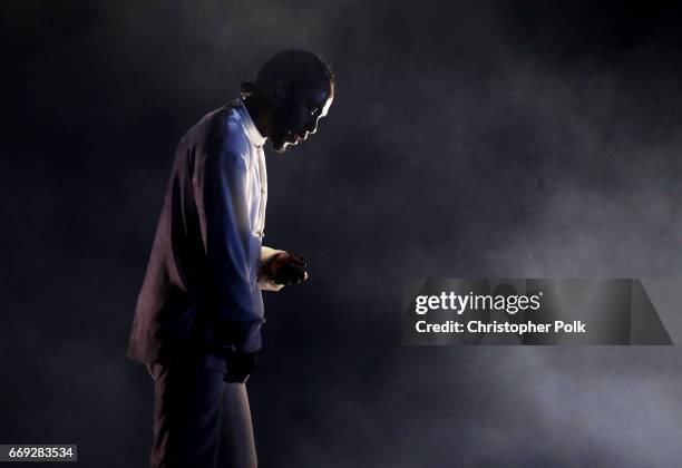 Rapper Kendrick Lamar performs on the Coachella Stage during day 3 of the Coachella Valley Music And Arts Festival at the Empire Polo Club on April...