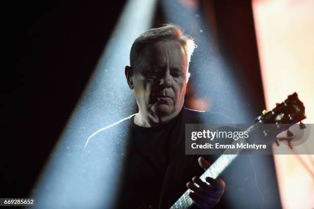 Musician Bernard Sumner of New Order performs on the Mojave stage during day 3 of the Coachella Valley Music And Arts Festival at the Empire Polo...