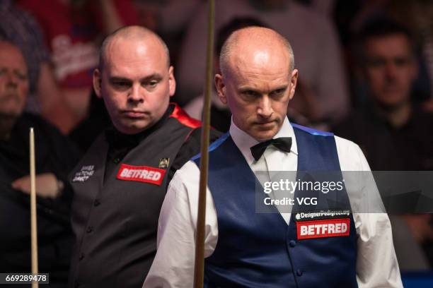 Peter Ebdon of England reacts during his first round match against Stuart Bingham of England on day two of Betfred World Championship 2017 at...