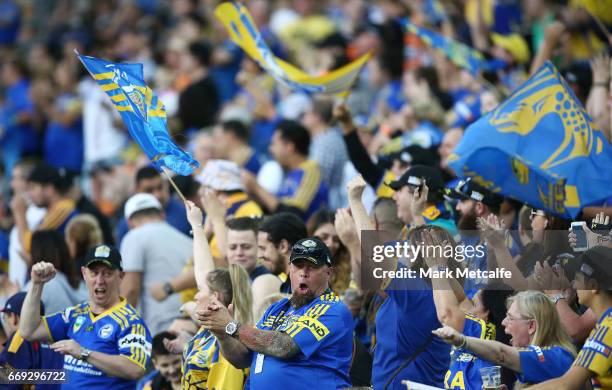 Eels fans celebrate a try during the round seven NRL match between the Parramatta Eels and the Wests Tigers at ANZ Stadium on April 17, 2017 in...