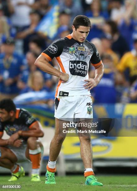 Mitch Moses of the Tigers looks dejected after defeat in the round seven NRL match between the Parramatta Eels and the Wests Tigers at ANZ Stadium on...