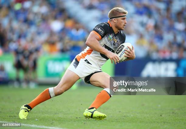 Matt Mcllwrick of the Tigers in action during the round seven NRL match between the Parramatta Eels and the Wests Tigers at ANZ Stadium on April 17,...