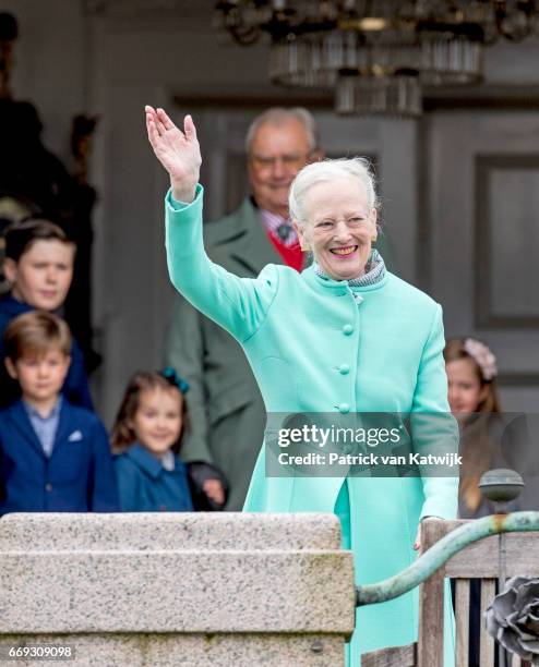 Queen Margrethe of Denmark waves during her 77th birthday celebrations at Marselisborg Palace on April 16, 2017 in Aarhus, Denmark.