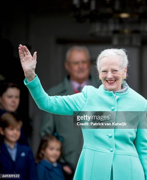 Queen Margrethe of Denmark waves during her 77th birthday celebrations at Marselisborg Palace on April 16, 2017 in Aarhus, Denmark.