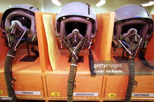 German Air Force helmets line the top row of lockers, July 19 at the German Air Force Flying Training Center near Alamogordo, New Mexico. The center...