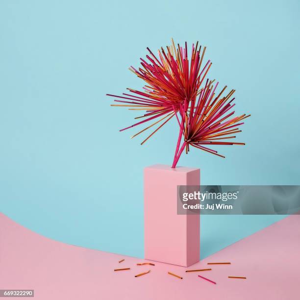 Contemporary still life with flowers made from metallic straws