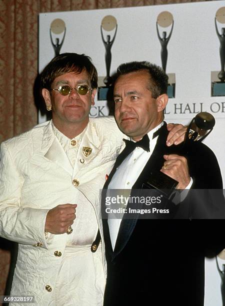 Elton John and Bernie Taupin attends the 1994 Rock and Roll Hall of Fame Induction Ceremony circa 1994 in New York City.