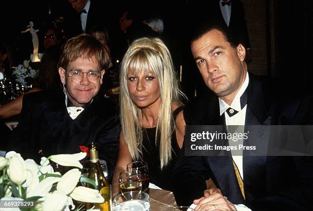 Elton John, Donatella Versace and Steven Seagal attend the 12th Annual Council of Fashion Designers of America Awards at Lincoln Center circa 1993 in...