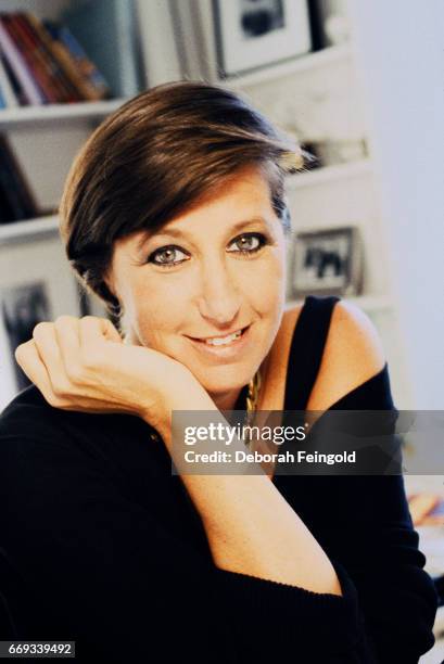 Deborah Feingold/Corbis via Getty Images) NEW YORK Fashion designer Donna Karan poses for a portrait in 1991 in New York City, New York.