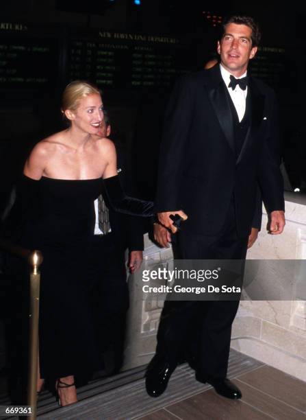 John F. Kennedy, Jr. And wife Carolyn attend a function in honor of his mother, Jacqueline Onasis, October 4, 1998 at Grand Central Station in New...