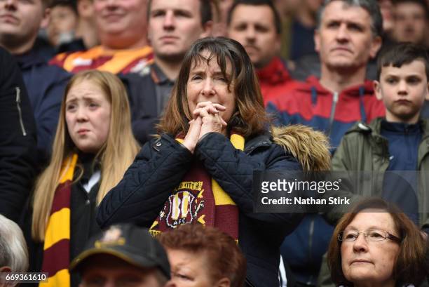 Bradford City fan looks on nervously during the Sky Bet League One match between Sheffield United and Bradford City at Bramall Lane on April 17, 2017...