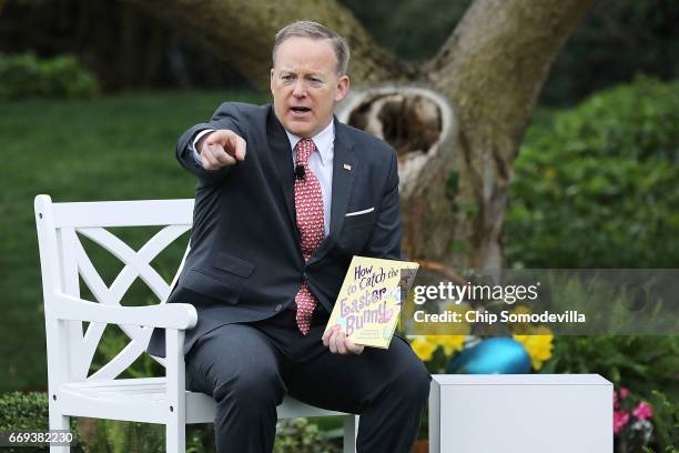 White House Press Secretary Sean Spicer reads the childrens' book 'How To Catch The Easter Bunny' during the 139th Easter Egg Roll on the South Lawn...