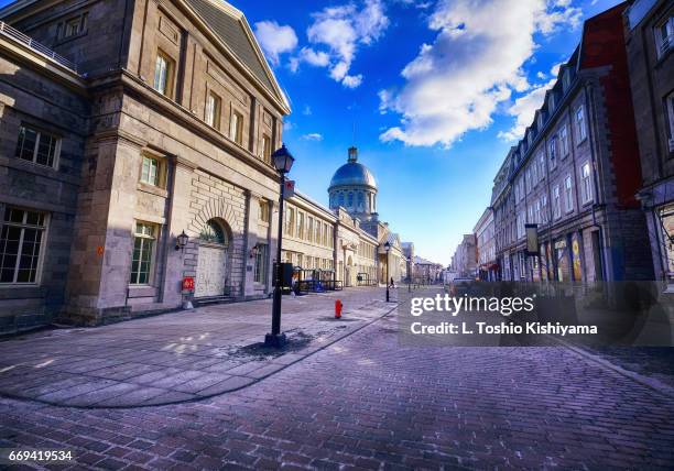 clouds over old town montreal, canada - vieux montréal stock pictures, royalty-free photos & images