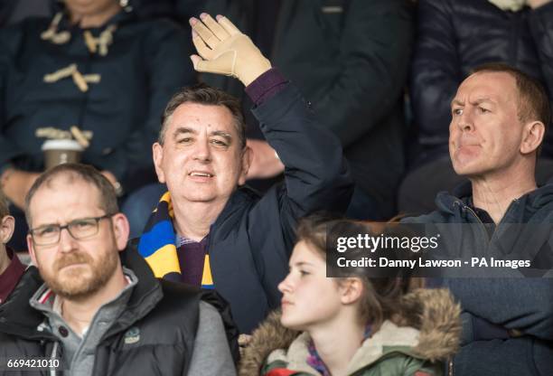 Chris King, the UK's first double hand transplant patient, applauds the Leeds Rhinos rugby league team on to the pitch at Headingley Carnegie stadium...