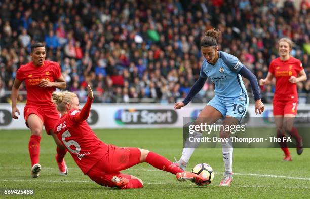 Sophie Ingle of Liverpool Ladies tackles Carli Lloyd of Manchester City Women during the SSE Women's FA Cup Semi-Final match between Manchester City...