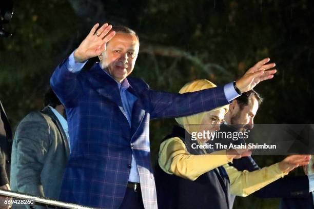 Turkish president Recep Tayyip Erdogan waves to supporters after the referendum on April 16, 2017 in Istanbul, Turkey. Millions of Turks are heading...