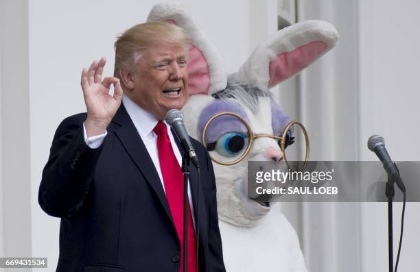 President Donald Trump speaks alongside the Easter Bunny during the 139th White House Easter Egg Roll on the South Lawn of the White House in...