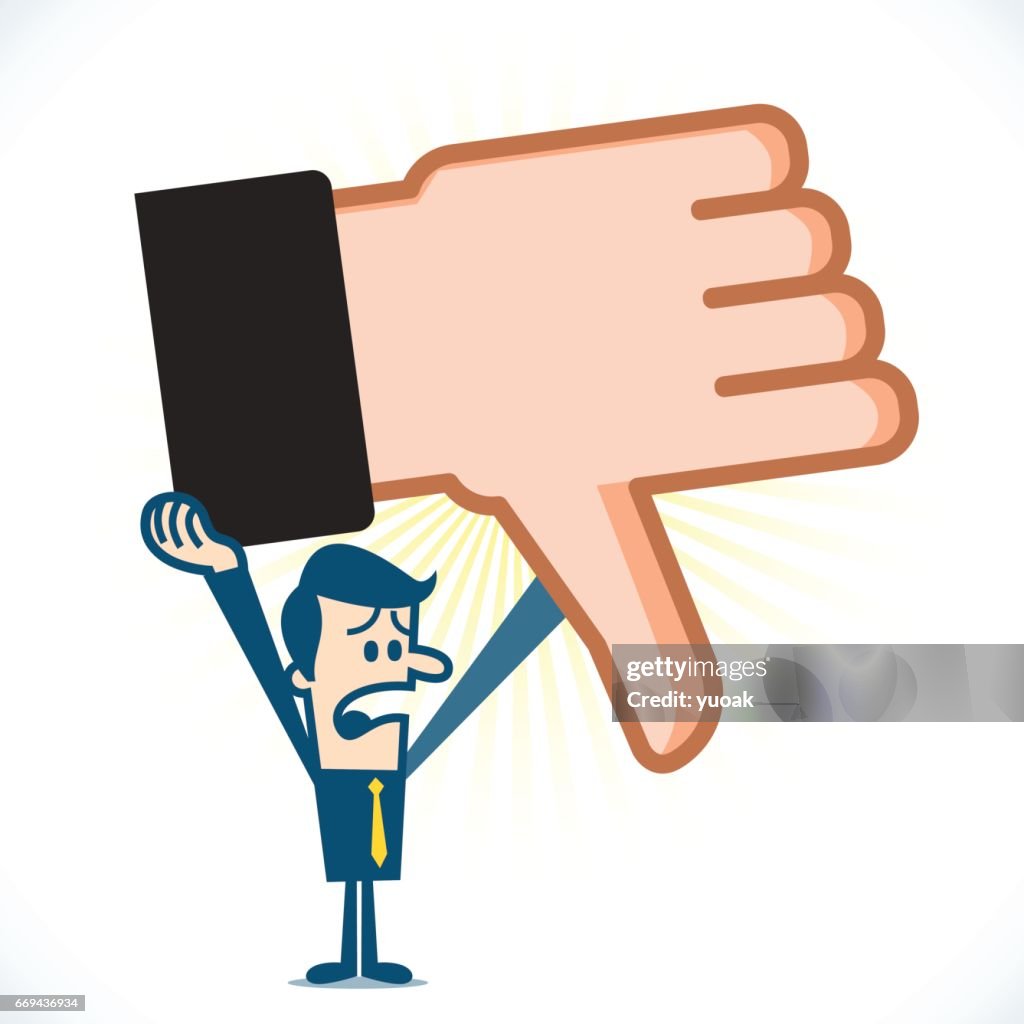 Man showing big thumb down