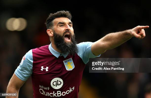 Mile Jedinak of Aston Villa instructs his team during the Sky Bet Championship match between Fulham and Aston Villa at Craven Cottage on April 17,...