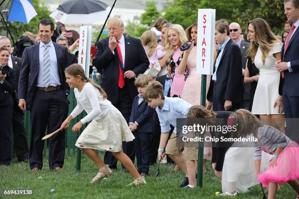 President Donald Trump and his family, including Donald Trump Jr., Tiffany Trump, first lady Melania Trump, Barron Trump, Lara Yunaska and Eric Trump...