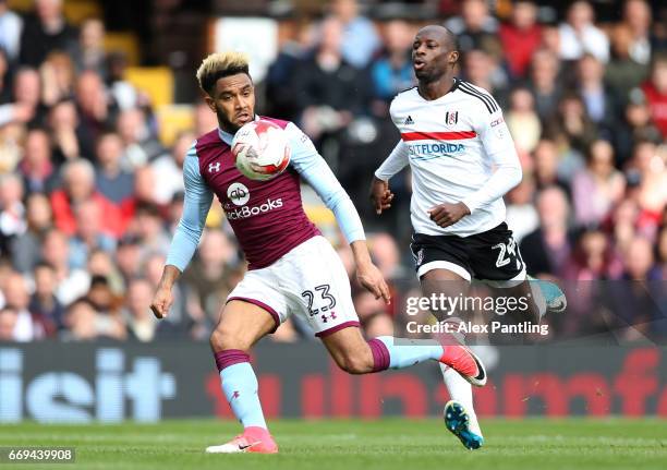 Jordan Amavi of Aston Villa and Sone Aluko of Fulham in action during the Sky Bet Championship match between Fulham and Aston Villa at Craven Cottage...