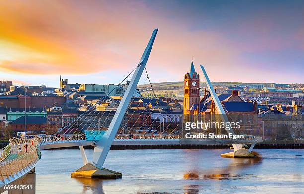peacebridge and guildhall, derry, northern ireland - river foyle stock pictures, royalty-free photos & images