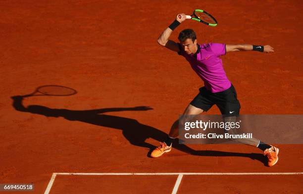 Andrey Kuznetsov of Russia in action against Tomas Berdych of the Czech Republic in their first round match on day two of the Monte Carlo Rolex...