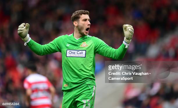 Doncaster Rovers' Marko Marosi celebrates after saving a penalty taken by Blackpool's Mark Cullen during the Sky Bet League Two match between...