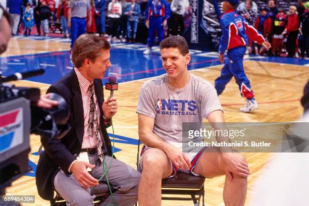 Drazen Petrovic of the New Jersey Nets talks to the media against the Detroit Pistons during a game played circa 1993 at the Brendan Byrne Arena in...
