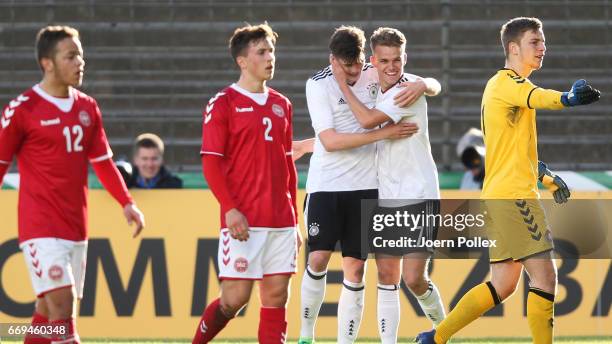 Tobias Warschewski of Germany celebrates with his team mate Niklas Shipnoski after scoring his team's first goal during the international friendly...