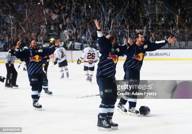 Yannic Seidenberg of Muenchen and his team mates celebrate winning the DEL Play-Offs Final Match 5 between EHC Muenchen and the Grizzlys Wolfsburg at...