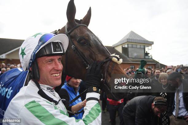 Meath , Ireland - 17 April 2017; Jockey Robbie Power celebrates with Our Duke after winning the Boylesports Irish Grand National Steeplechase during...