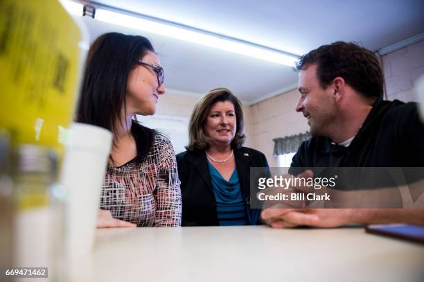 Karen Handel, candidate for the Georgia 6th Congressional district, speaks with diners during a campaign stop at Rhea's restaurant in Roswell, Ga.,...