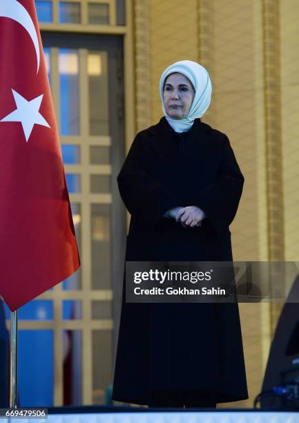 Turkish First Lady Emine Erdogan listens President Erdogan's victory speech to his supporters at the Presidential Palace on April 17, 2017 in Ankara...