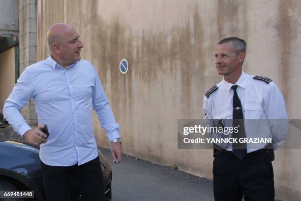 French district attorney Nicolas Bessonne and the regional director of public security in Haute-Corse, Eric Eudes wait before giving a press...