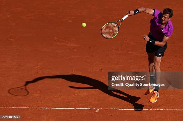 Andrey Kuznetsov of Russia serves during his match against Tomas Berdych of the Czech Republic during day two of the ATP Monte Carlo Rolex Masters...