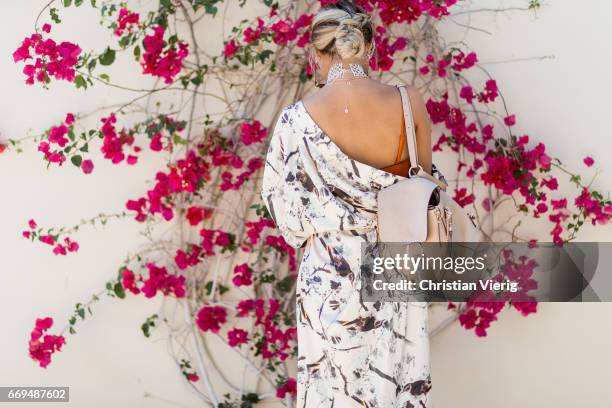 Guest wearing a Chloe backpack at the Revovle Festival during day 3 of the 2017 Coachella Valley Music & Arts Festival Weekend 1 on April 16, 2017 in...