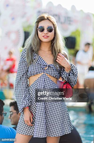 Jennifer Mun wearing a plaid dress at the Revovle Festival during day 3 of the 2017 Coachella Valley Music & Arts Festival Weekend 1 on April 16,...