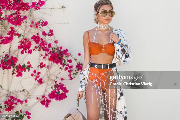 Guest weairng a bikini and Chloe backpack at the Revovle Festival during day 3 of the 2017 Coachella Valley Music & Arts Festival Weekend 1 on April...