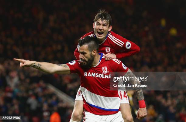 Alvaro Negredo of Middlesbrough celebrates as he scores their first goal with Marten de Roon during the Premier League match between Middlesbrough...