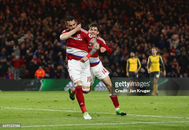 Alvaro Negredo of Middlesbrough celebrates as he scores their first goal with Marten de Roon during the Premier League match between Middlesbrough...