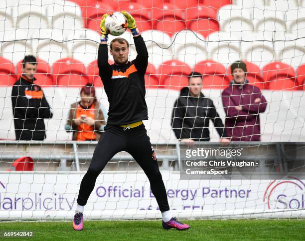 Doncaster Rovers' Mathieu Baudry handles the ball, under pressure from Blackpool's Jamille Matt, giving away a penalty prior to the Sky Bet League...