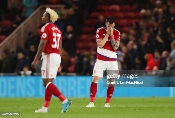 Alvaro Negredo of Middlesbrough and team mate Adama Traore look dejected in defeat after during the Premier League match between Middlesbrough and...