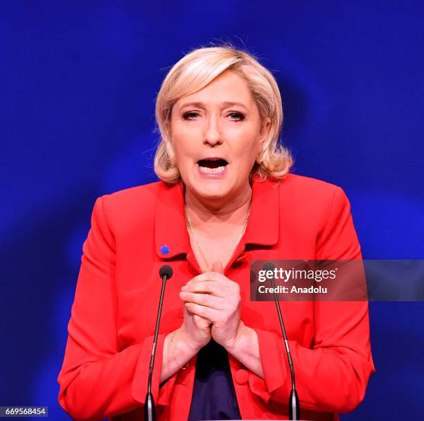 French Presidential Election candidate Marine Le Pen, the leader of France's far-right Front National political party delivers her speech during a...