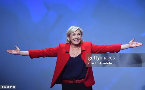 French Presidential Election candidate Marine Le Pen, the leader of France's far-right Front National political party gestures during a campaign...