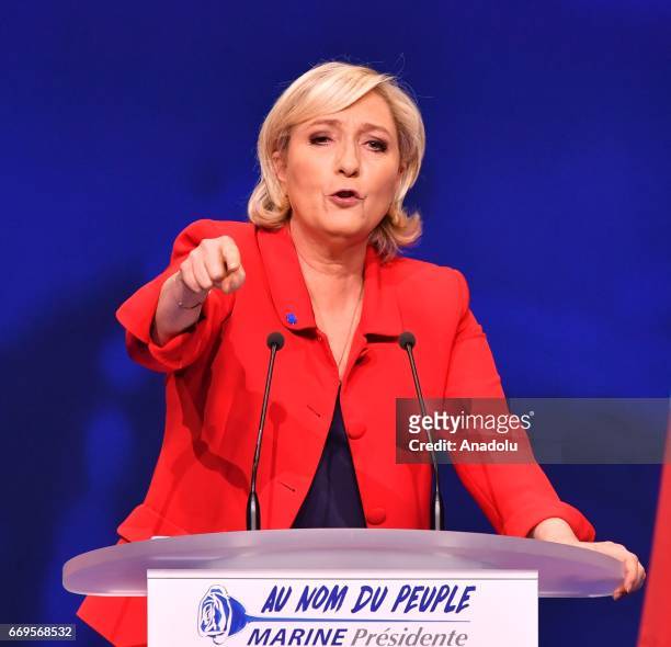 French Presidential Election candidate Marine Le Pen, the leader of France's far-right Front National political party delivers her speech during a...
